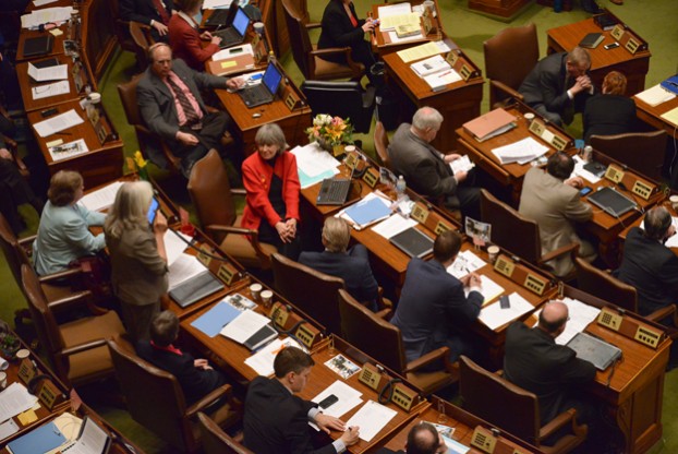 Karen Clark listening to another legislator