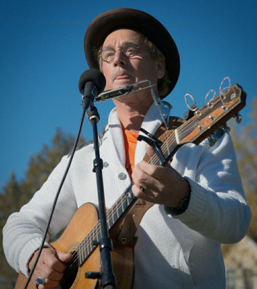 Larry Long provided music at the Stop PolyMet! rally | Steve Timmer photo